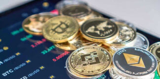 Cryptocurrency coins on a trading screen background