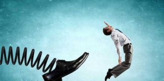 Man gets kicked by oversized shoe on spring